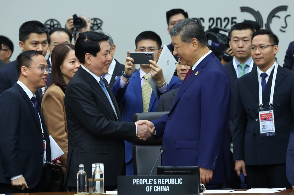 Chinese President Xi Jinping (front, right), shakes hands with Vietnam’s President Luong Cuong at the Apec Leaders’ Meeting in Gyeongju, South Korea on Friday. Photo: AP Chinese President Xi Jinping (front, right), shakes hands with Vietnam’s President Luong Cuong at the Apec Leaders’ Meeting in Gyeongju, South Korea on Friday. Photo: AP
