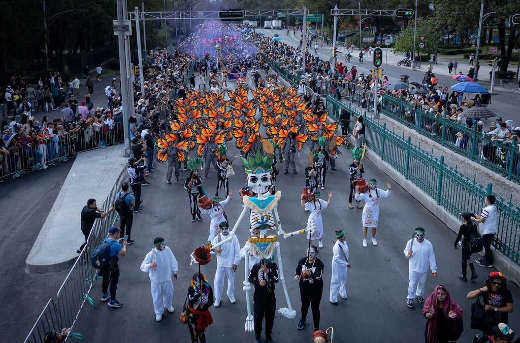 Revellers attend the grand parade commemorating the Day of the Dead in Mexico City on Saturday. Photo: AFP
