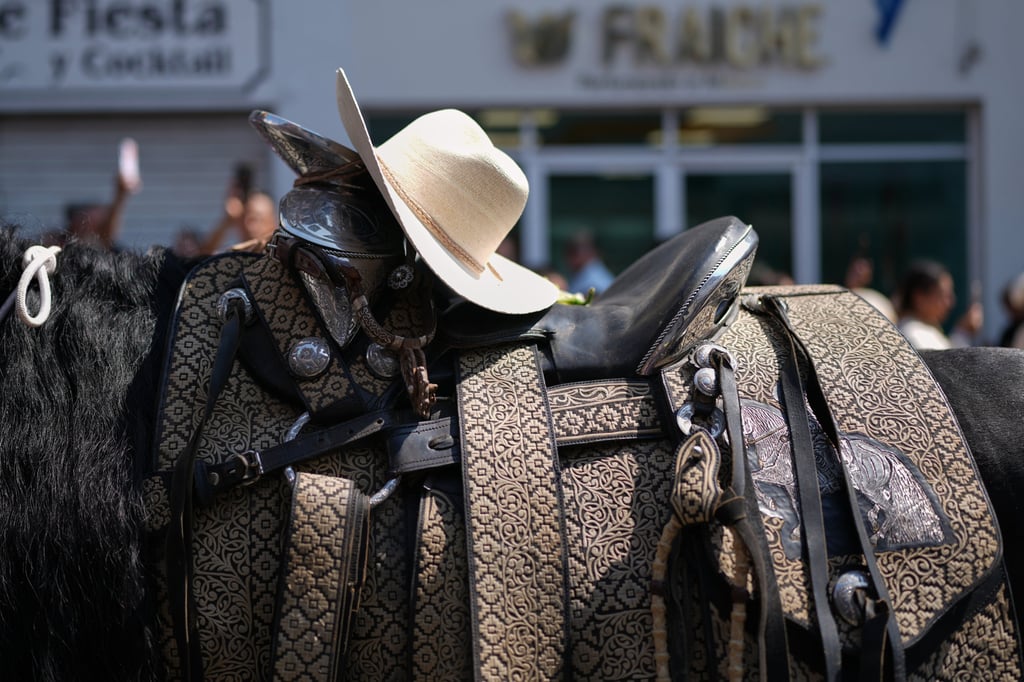 A hat worn by Carlos Alberto Manzo Rodriguez, who was shot during the Day of the Dead celebrations. Photo: AP A hat worn by Carlos Alberto Manzo Rodriguez, who was shot during the Day of the Dead celebrations. Photo: AP