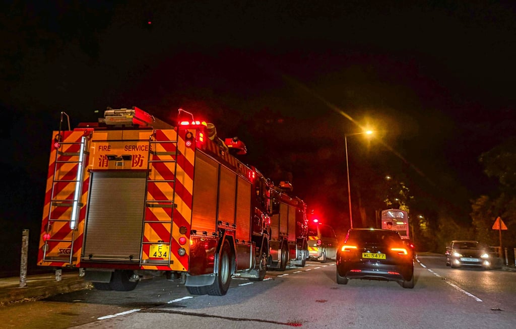 Firefighters remained on standby after the blaze was put out. Photo: Denise Tsang Firefighters remained on standby after the blaze was put out. Photo: Denise Tsang