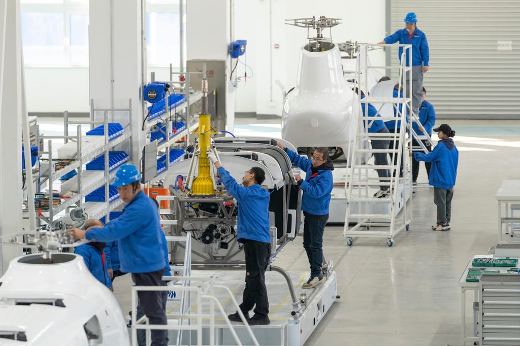 Workers assemble the Boying T1400 at the United Aircraft factory in Harbin, northeast China. The company estimates its production line could produce up to 1,000 units annually. Photo: Xinhua Workers assemble the Boying T1400 at the United Aircraft factory in Harbin, northeast China. The company estimates its production line could produce up to 1,000 units annually. Photo: Xinhua