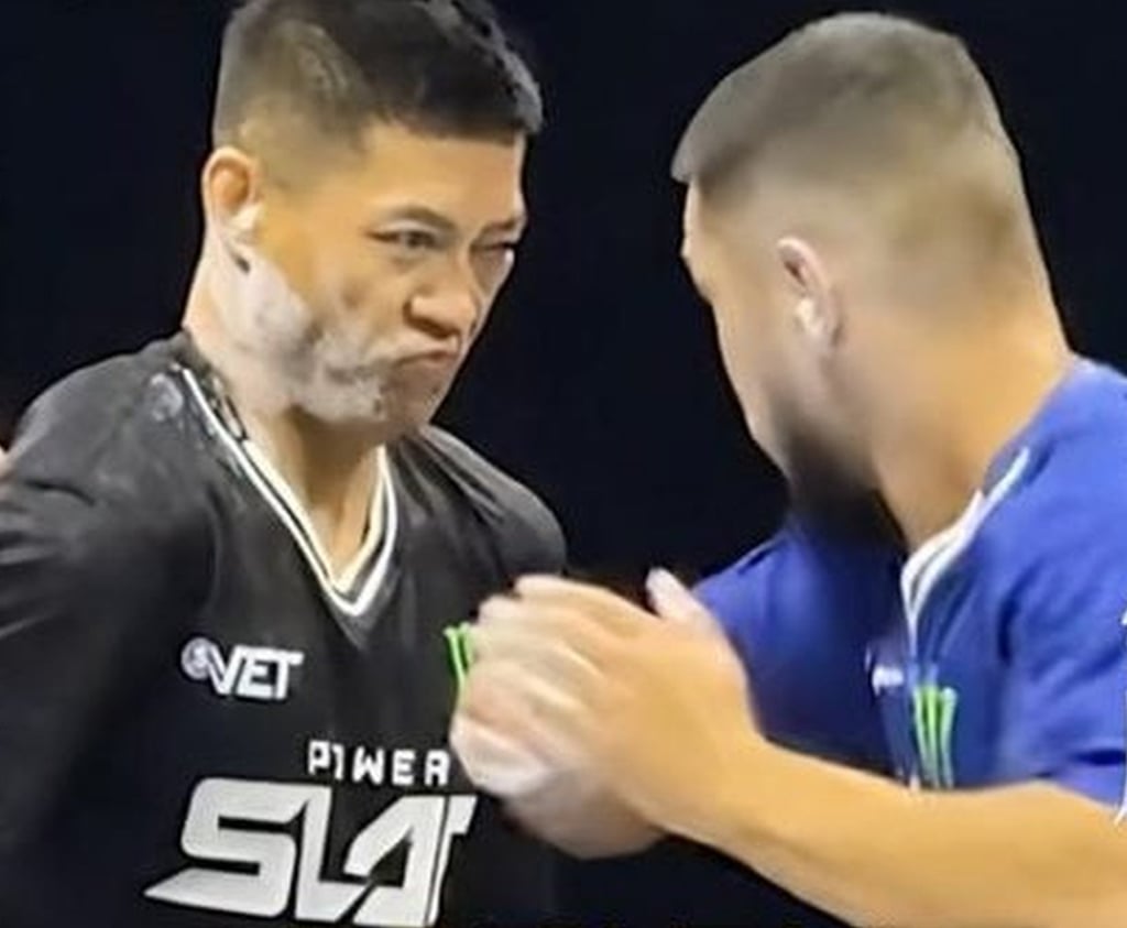 Online celebrity and martial arts exponent Zhao braces for a slap from his Kazakh opponent. Photo: YouTube/China Power Online celebrity and martial arts exponent Zhao braces for a slap from his Kazakh opponent. Photo: YouTube/China Power
