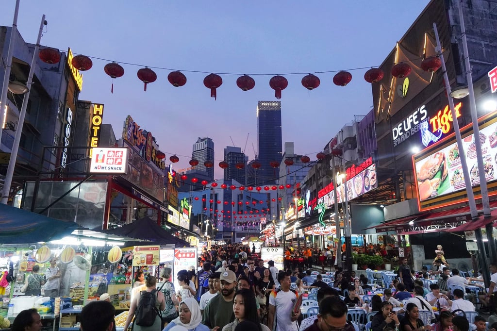 People crowd the Bukit Bintang shopping area in Kuala Lumpur, Malaysia, in July. Photo: Getty Images People crowd the Bukit Bintang shopping area in Kuala Lumpur, Malaysia, in July. Photo: Getty Images