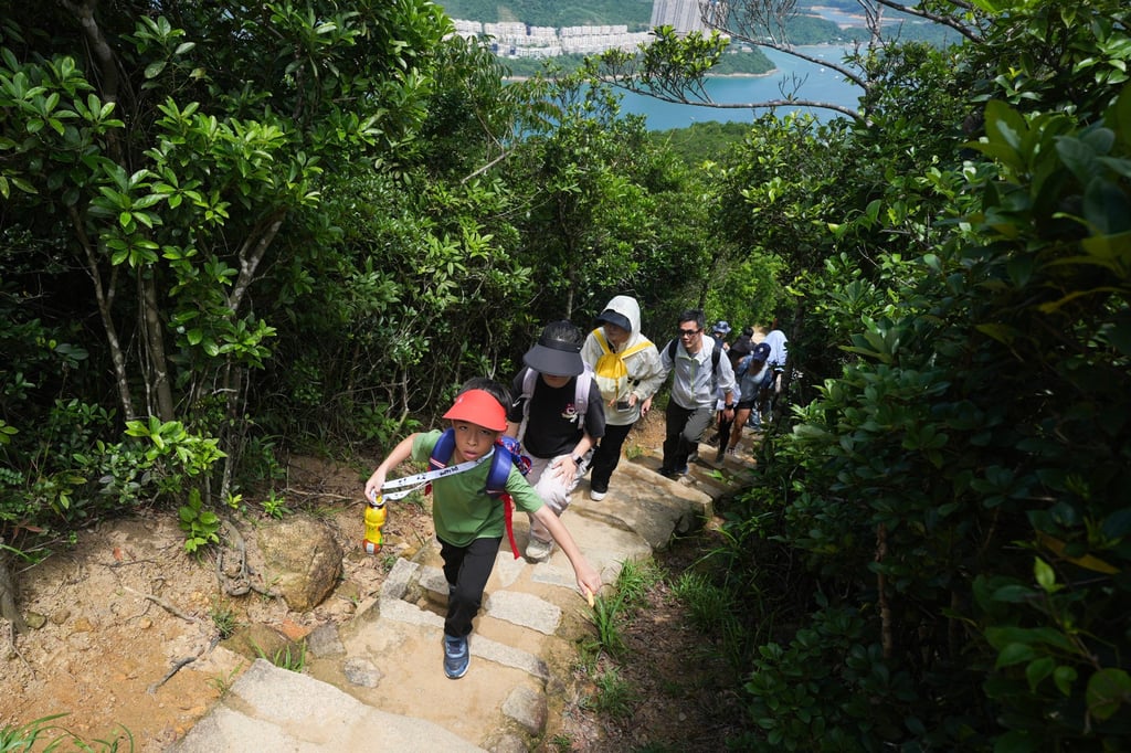Hikers on the Dragon’s Back trail in the Shek O Country Park, in Hong Kong. Walking in nature has been shown to boost physical and mental health. Photo: Eugene Lee Hikers on the Dragon’s Back trail in the Shek O Country Park, in Hong Kong. Walking in nature has been shown to boost physical and mental health. Photo: Eugene Lee