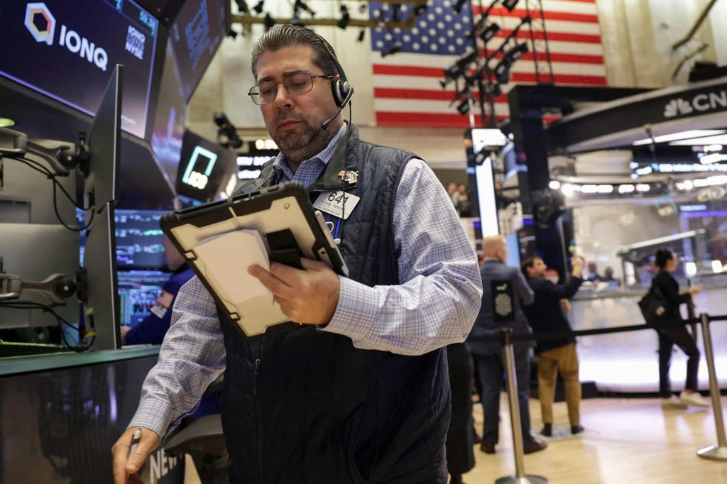 Traders work on the floor of the New York Stock Exchange. Photo: AFP