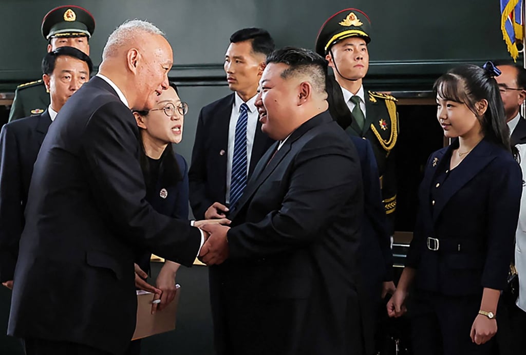 Kim Jong-un (centre) and daughter Ju-ae (right) are greeted by Chinese officials upon their arrival at the Beijing Railway Station on September 2. Photo: KCNA/AFP Kim Jong-un (centre) and daughter Ju-ae (right) are greeted by Chinese officials upon their arrival at the Beijing Railway Station on September 2. Photo: KCNA/AFP