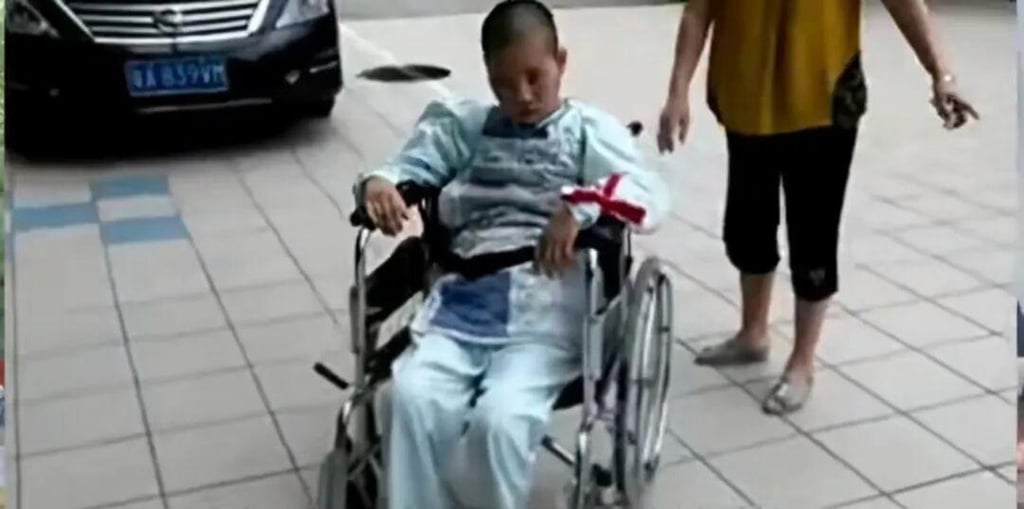Yang was left in a wheelchair after she fell ill and slipped into a coma 10 years ago. Photo: Baidu Yang was left in a wheelchair after she fell ill and slipped into a coma 10 years ago. Photo: Baidu