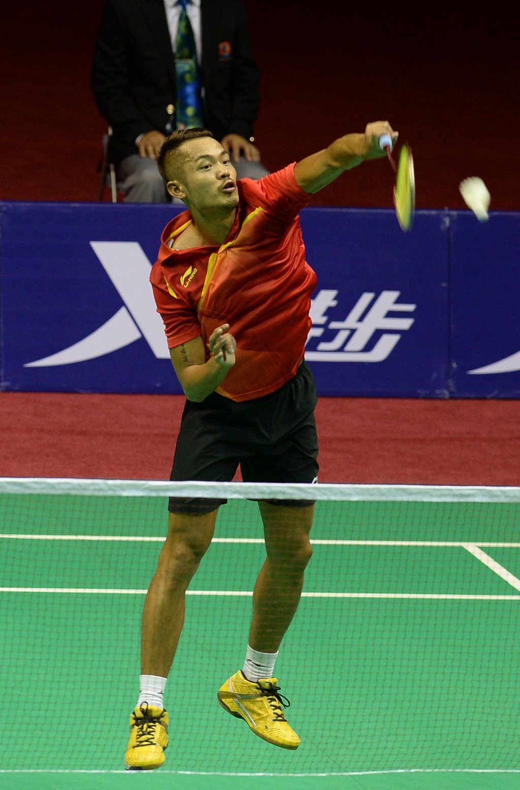 Badminton superstar Lin Dan in action for the People’s Liberation Army team at the 12th National Games held in Liaoning province in 2013. Photo: Xinhua