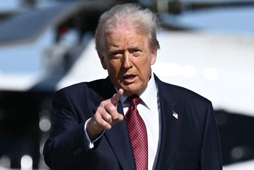 US President Donald Trump points as he walks to board Air Force One on Wednesday. Photo: AFP US President Donald Trump points as he walks to board Air Force One on Wednesday. Photo: AFP