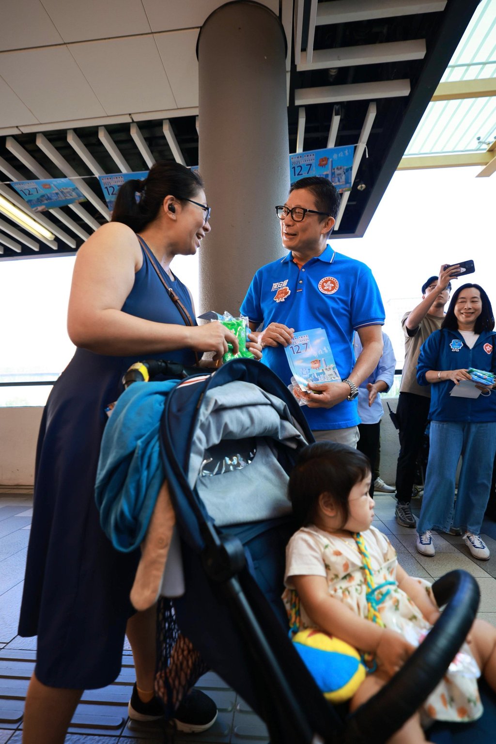 Secretary for Security Chris Tang hands out election leaflets in Sham Shui Po on Saturday. Photo: Handout Secretary for Security Chris Tang hands out election leaflets in Sham Shui Po on Saturday. Photo: Handout