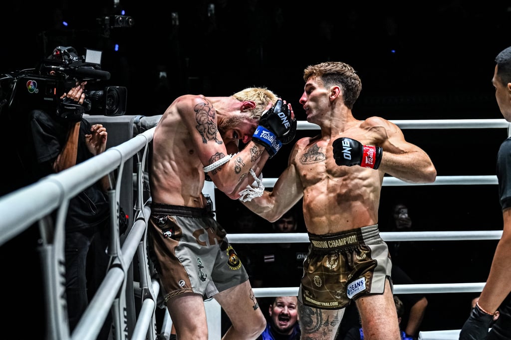 Nico Carrillo (right) trapped Luke Lessei into the corner before the referee stopped the fight. Photo: ONE Championship