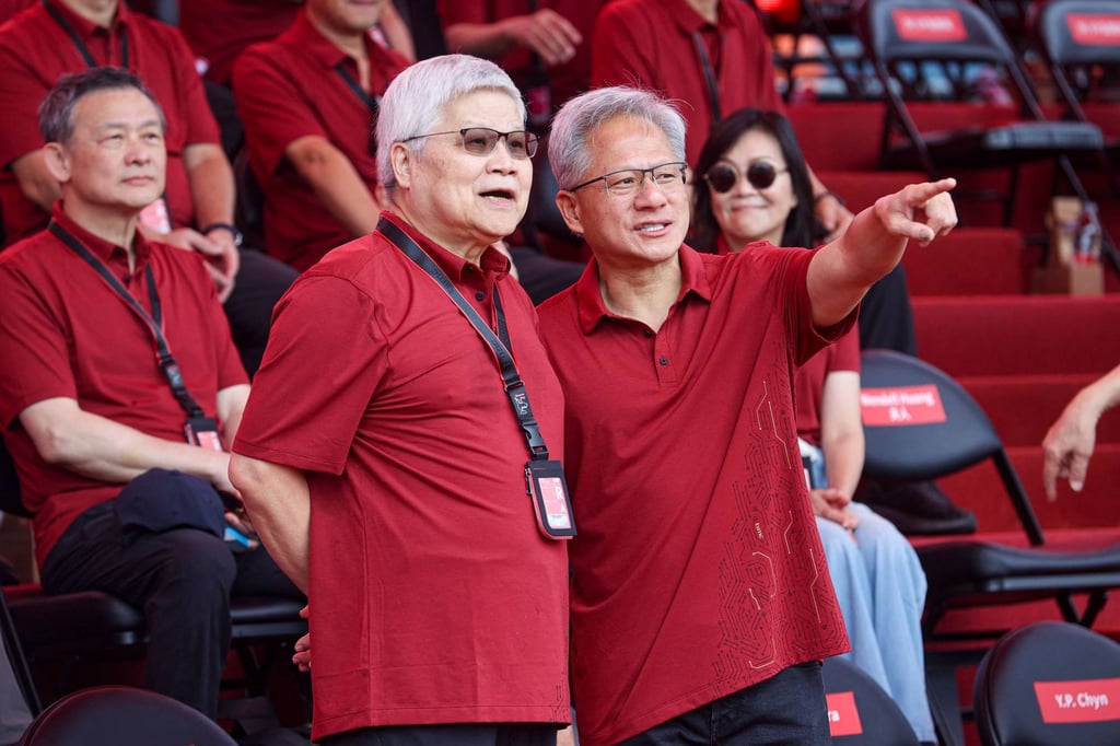 C. C Wei (left), the chairman, president and CEO of Taiwan Semiconductor Manufacturing Co, stands beside Nvidia CEO Jensen Huang at the TSMC sports day event in Hsinchu, Taiwan, on November 8, 2025. Photo: AFP