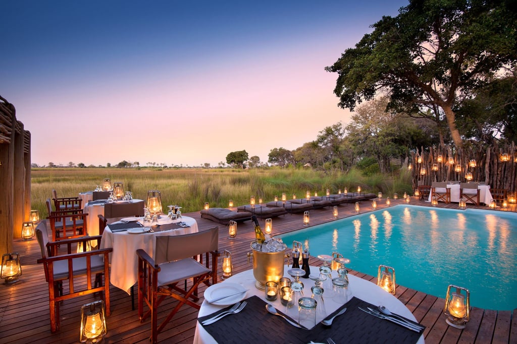 A romantic dinner by the pool at andBeyond Nxabega Okavango Tented Camp in Botswana. Photo: Handout A romantic dinner by the pool at andBeyond Nxabega Okavango Tented Camp in Botswana. Photo: Handout