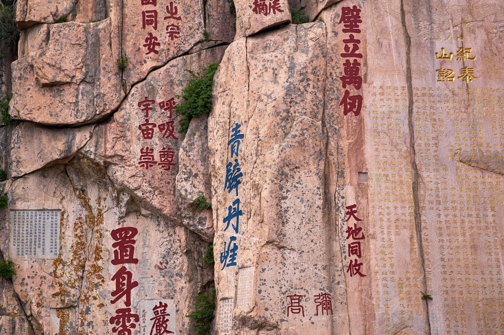 Inscriptions on a rock face at Taishan Mountain, which is a protected site in China. Photo: Shutterstock Inscriptions on a rock face at Taishan Mountain, which is a protected site in China. Photo: Shutterstock