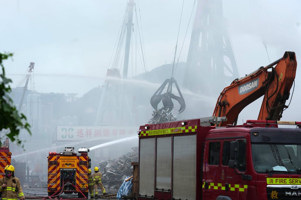 Firefighters tackle the blaze. Photo: Jelly Tse