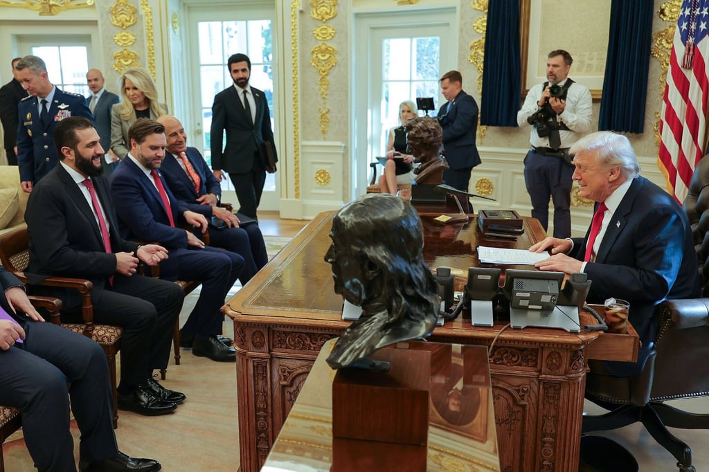 Syria’s President Ahmed al-Sharaa meeting with US President Donald Trump in the Oval Office. Photo: Syrian Presidency Press Office via AP