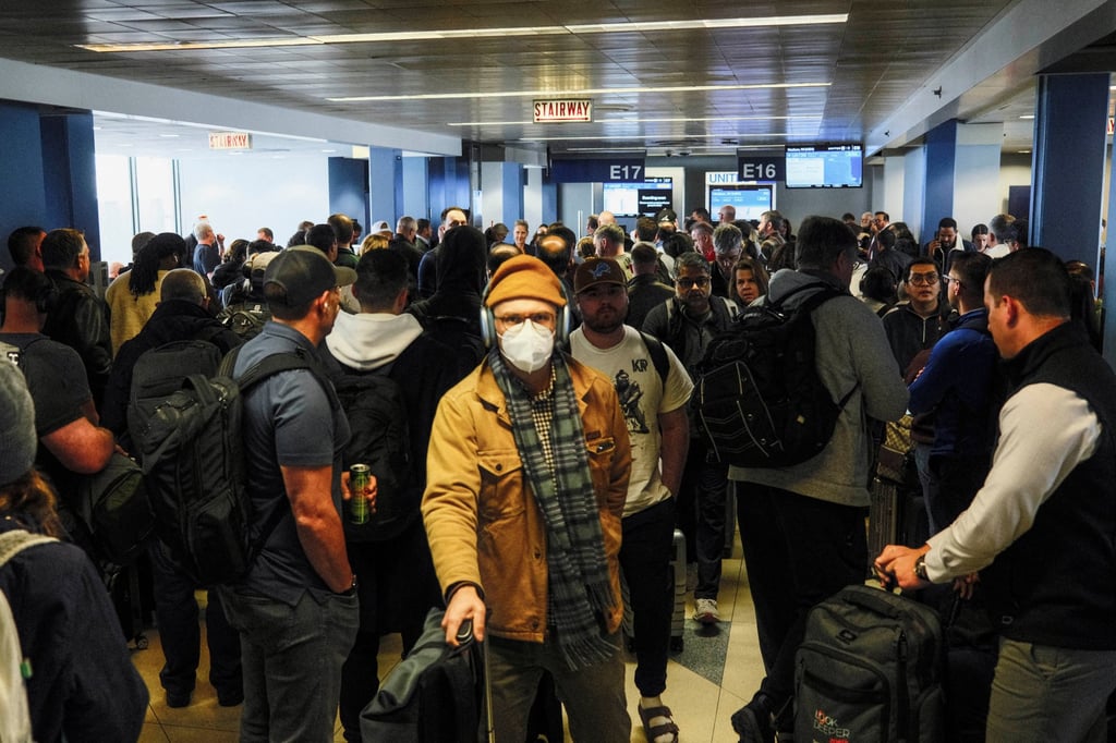 Travellers crowd a terminal at O’Hare International Airport in Chicago, as flight delays continue. Photo: Reuters Travellers crowd a terminal at O’Hare International Airport in Chicago, as flight delays continue. Photo: Reuters