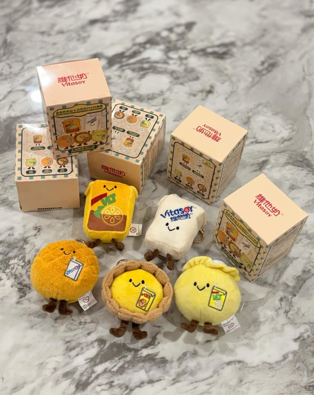 A new series of Vitasoy plushies features everyday Hong Kong food and drink items, from lemon tea to egg tarts and siu mai. Photo: Instagram/ettason.au