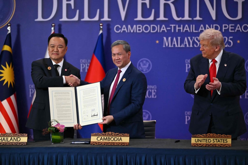 US President Donald Trump looked on after Cambodia’s Prime Minister Hun Manet and Thailand’s Prime Minister Anutin Charnvirakul signed a ceasefire agreement in Kuala Lumpur on October 26. Photo: AFP