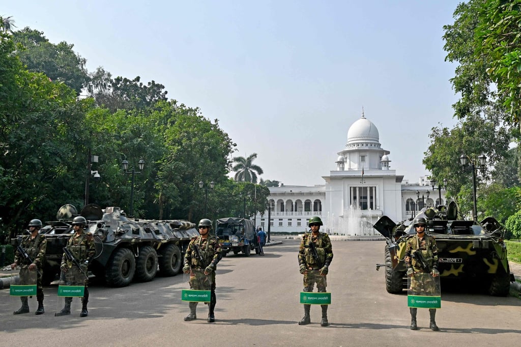 Bangladesh’s army personnel stand guard at the International Crimes Tribunal's premises in Dhaka on Thursday. The verdict in the crimes against humanity trial of fugitive former prime minister Sheikh Hasina will be delivered on Monday. Photo: AFP