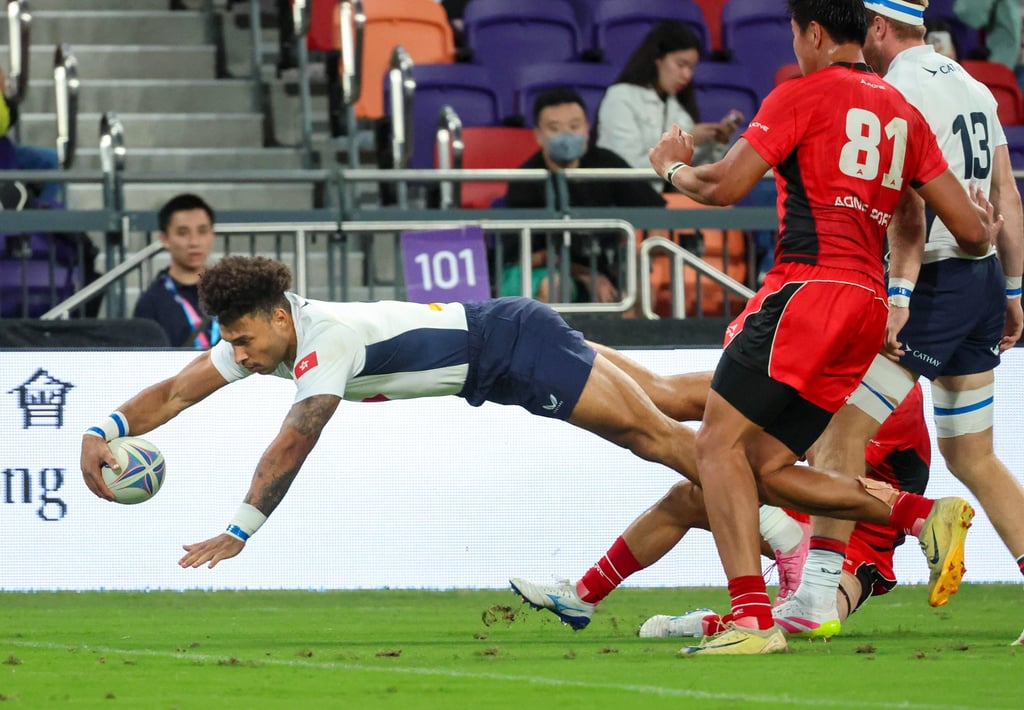 Hong Kong’s Max Denmark scores a try on Thursday. Photo: Dickson Lee Hong Kong’s Max Denmark scores a try on Thursday. Photo: Dickson Lee