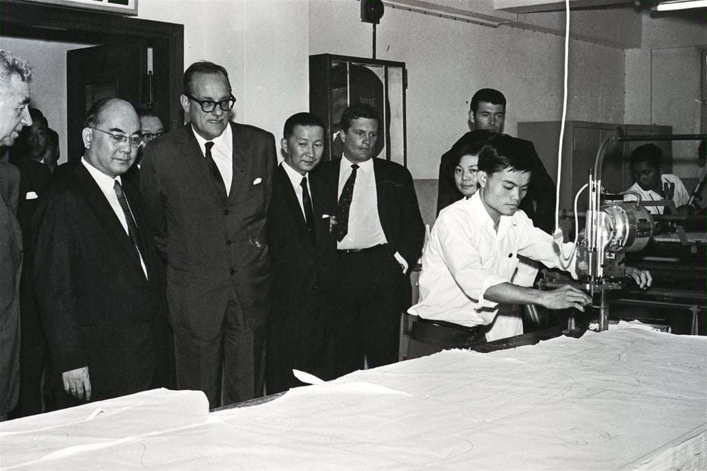 Hong Kong Governor Sir David Trench (second from left) visits the Winner Garments factory in 1967. Photo: SCMP Archives