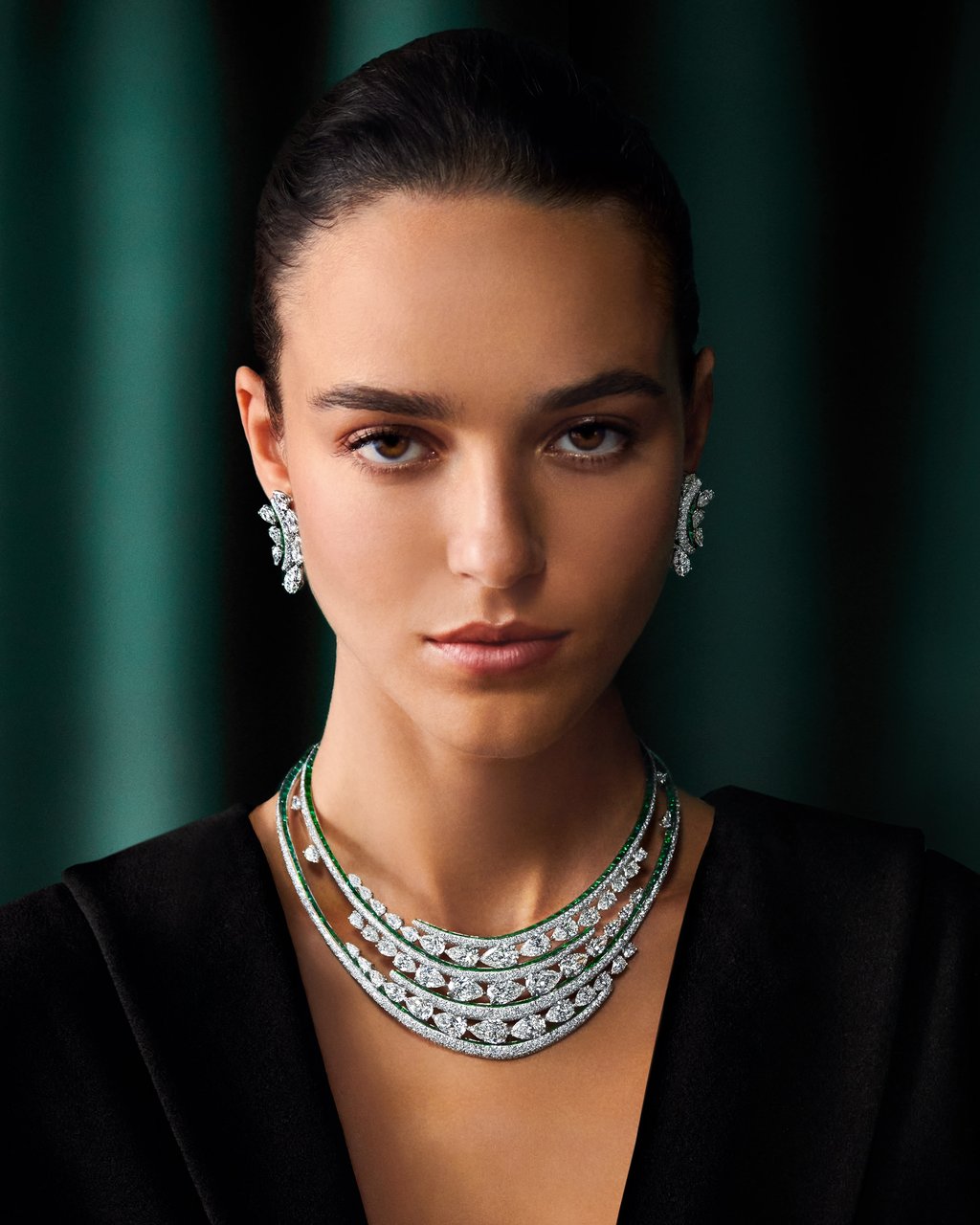 Graff high jewellery pear shape and round diamond and emerald cut emerald necklace and earrings. Photo: Handout