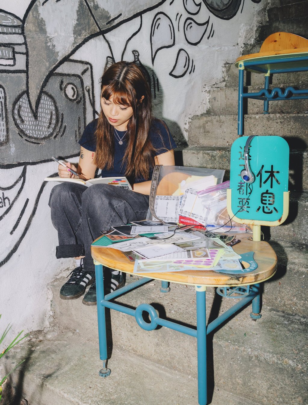 Cehryl Chow, pictured in Sheung Wan, Hong Kong, says she likes the DIY ethic of zines. Photo: Jocelyn Tam