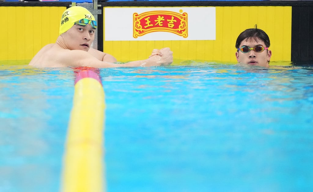 Both Sun Yang (left) and Pan Zhanle were bettered by Zhang in the 200m freestyle. Photo: Xinhua