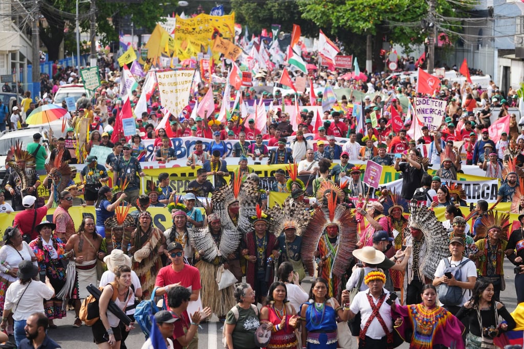 Activists take part in a climate protest during the Cop30 UN climate summit on Saturday in Belem, Brazil. Photo: AP Activists take part in a climate protest during the Cop30 UN climate summit on Saturday in Belem, Brazil. Photo: AP