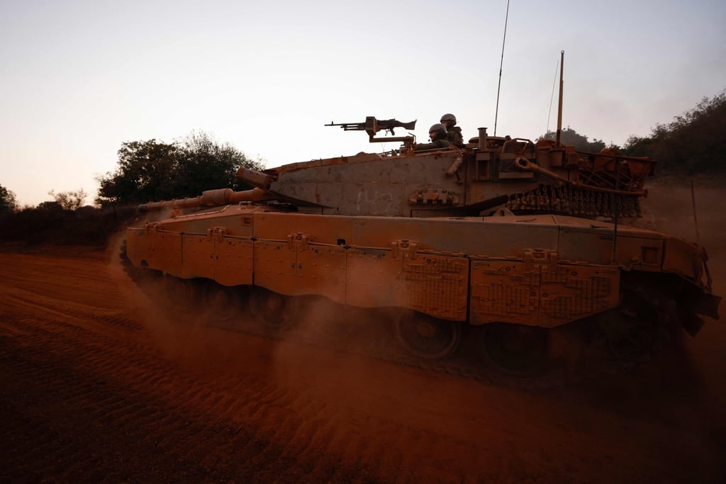 An Israeli Merkava main battle tank at a position in northern Israel along the border with southern Lebanon on November 6. Photo: AFP