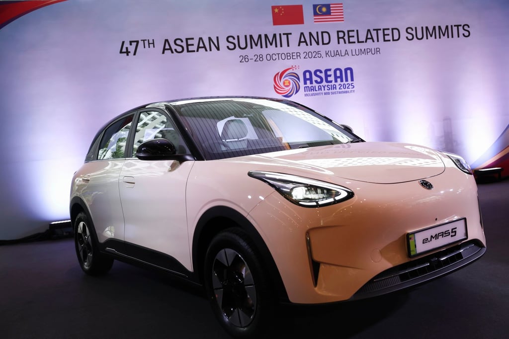 A car produced by Malaysia’s national carmaker, Proton, in which China’s Zhejiang Geely Holding Group holds a 49.9 per cent stake, is displayed in Kuala Lumpur. Photo: EPA A car produced by Malaysia’s national carmaker, Proton, in which China’s Zhejiang Geely Holding Group holds a 49.9 per cent stake, is displayed in Kuala Lumpur. Photo: EPA
