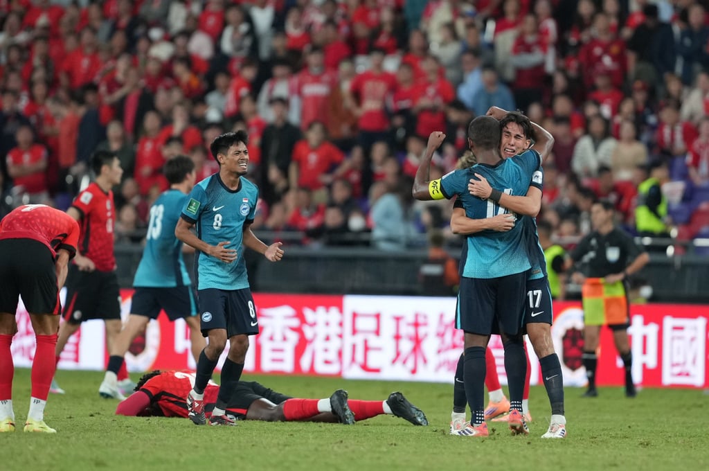 Singapore players celebrate their famous victory at Kai Tak Stadium. Photo: Sam Tsang