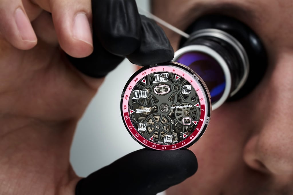 Inspecting the ingenious movement of the Richard Mille RM 63-02 Automatic Worldtimer. Photo: Handout