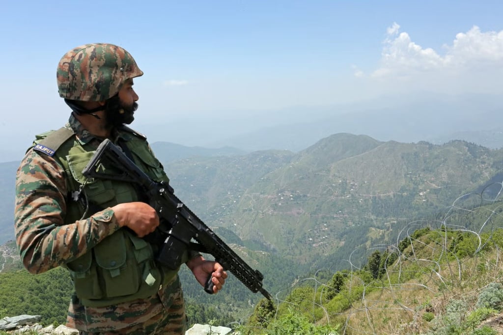 An Indian soldier on duty near the Line of Control separating Pakistan and India in May. Photo: AFP