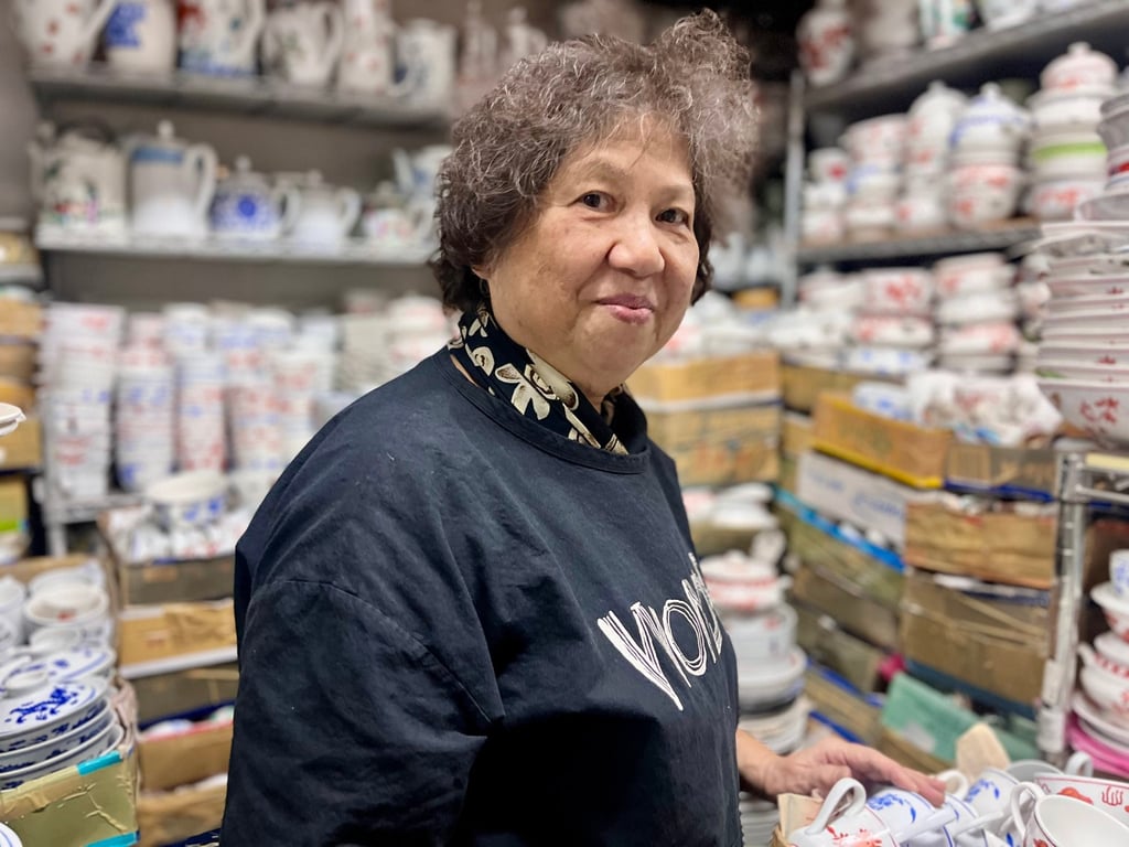 Anita Tso stands among porcelain pieces at Yuet Tung China Works, a porcelain factory in Hong Kong. Photo: Kylie Knott