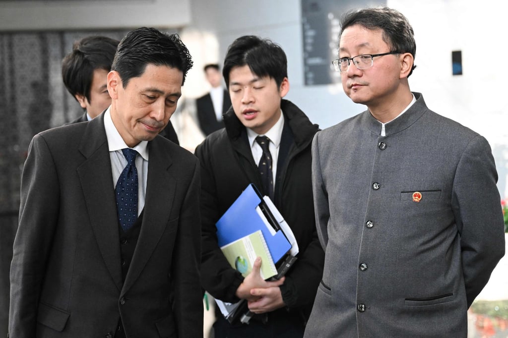 Talks between Masaaki Kanai (left) and Liu Jinsong ended without consensus. Photo: AFP