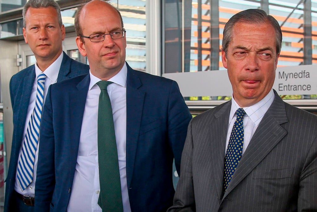 Nathan Gill (left) and Nigel Farage (right) attend a European Parliament election campaign rally in Cardiff Bay, south Wales, on May 15, 2019. Photo: AFP