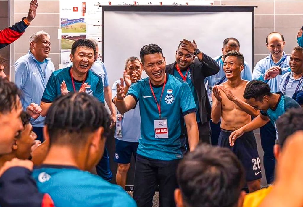 Minister David Neo (middle) addresses the Singapore squad after the match on Tuesday. Photo: Handout