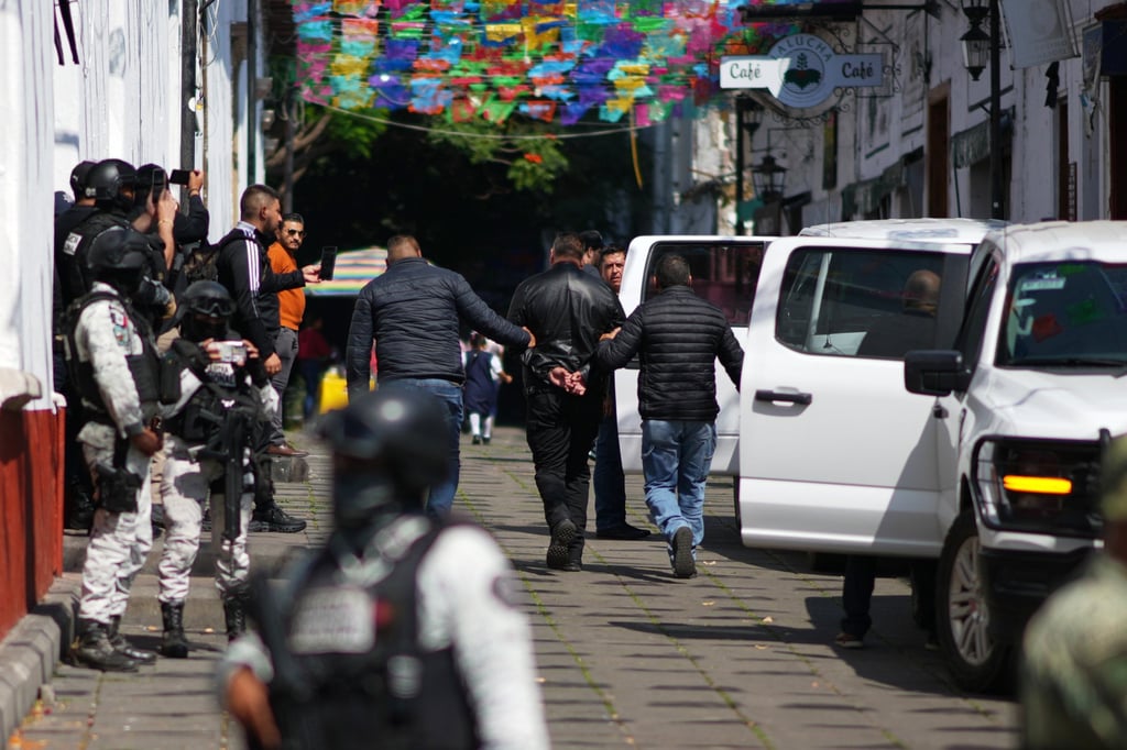 Michoacan state prosecutor officers detain a suspect in the killing of Mayor Carlos Manzo Rodriguez in Uruapan, Mexico, on Friday. Photo: AP