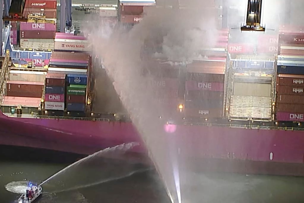 This image taken from a video shows first responders battling a blaze on a container ship docked at the Port of Los Angeles on Friday. Photo: ABC7/AP