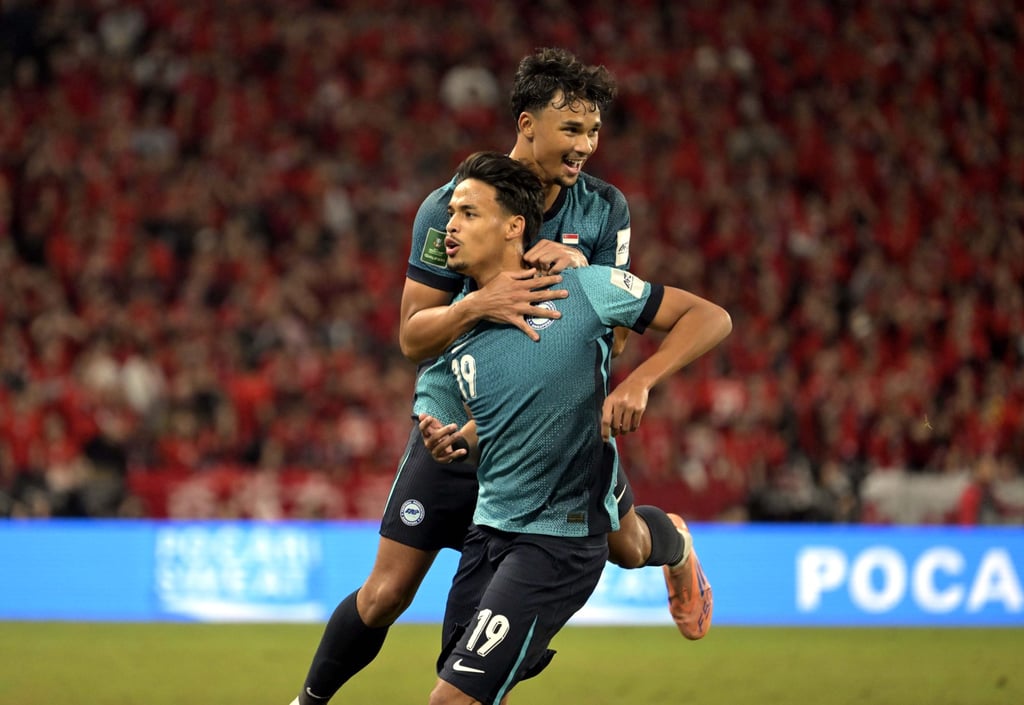 Ilhan Fandi is congratulated by Ikhsan Fandi following his winning strike. Photo: Xinhua Ilhan Fandi is congratulated by Ikhsan Fandi following his winning strike. Photo: Xinhua