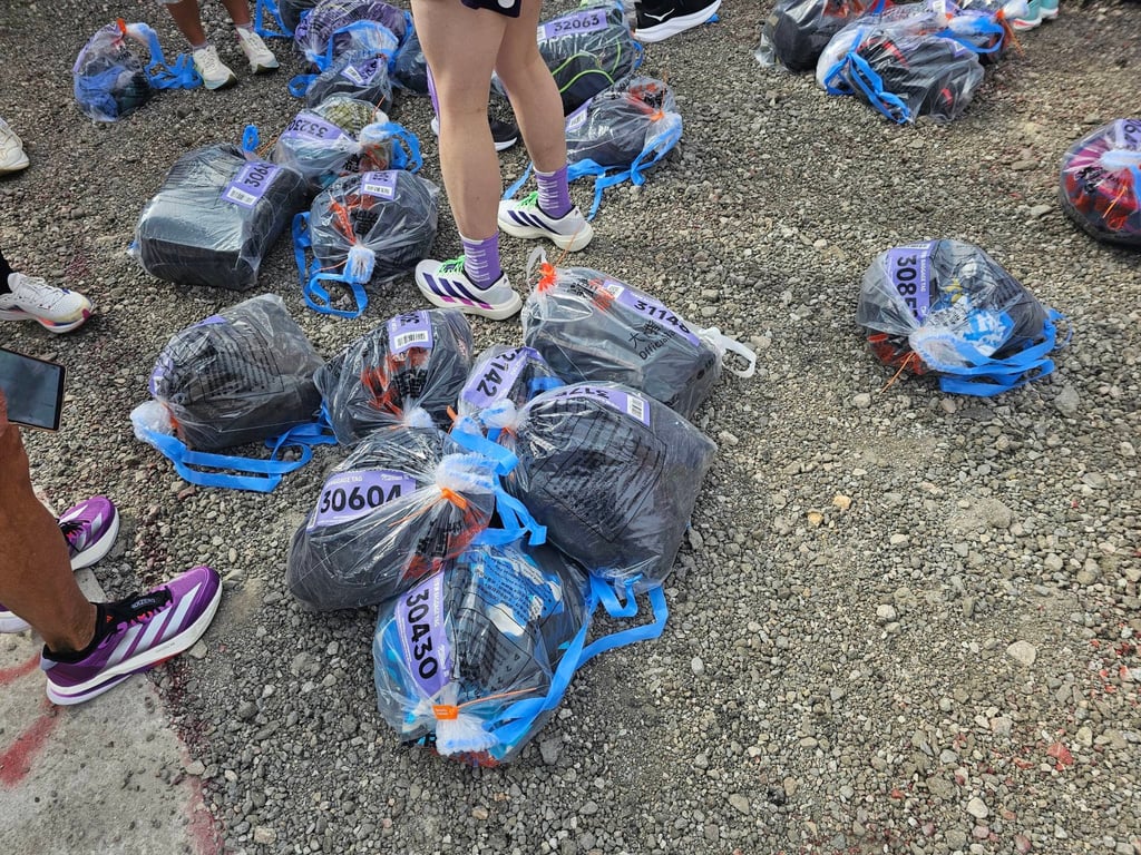 Baggage chaos at the Kerry Hong Kong Streetathon left runners scavenging for hours to find their belongings. Photo: Handout