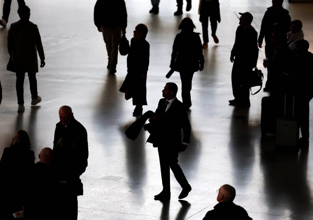 Passengers at Waterloo Station in London. Photo: EPA