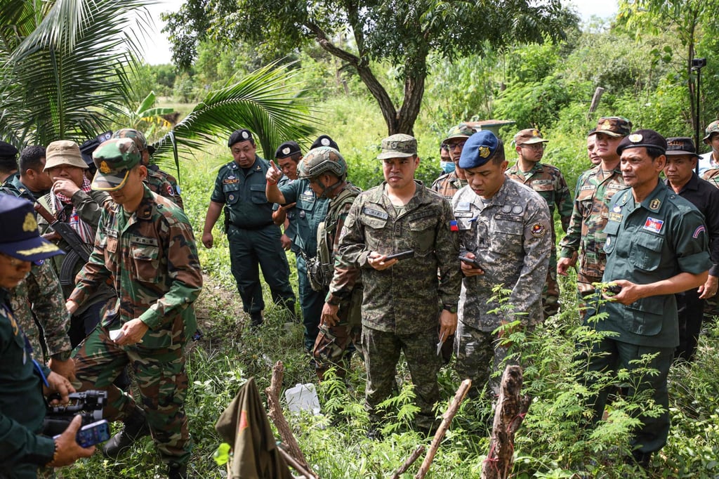 An Asean observer team visiting on November 13 an area along the Cambodia-Thailand border where a civilian was killed a day earlier. Photo: AFP