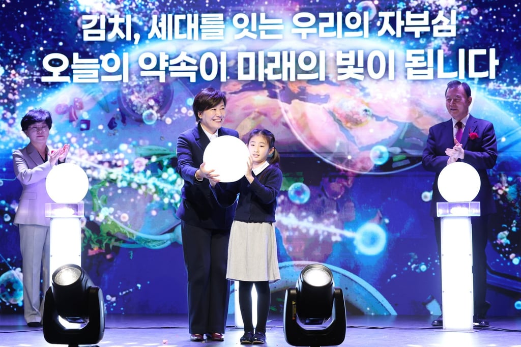 Agriculture Minister Song Mi-ryung (centre, left) takes part in a ceremony for Kimchi Day at the National Folk Museum in Seoul last week. Song says South Korea will continue to promote kimchi abroad as a strategic export. Photo: EPA/Yonhap