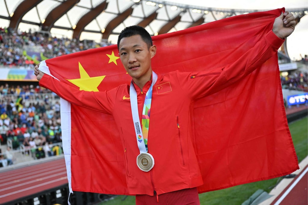 Wang Jianan after winning the long jump final at 2022 World Championships. Photo: AFP