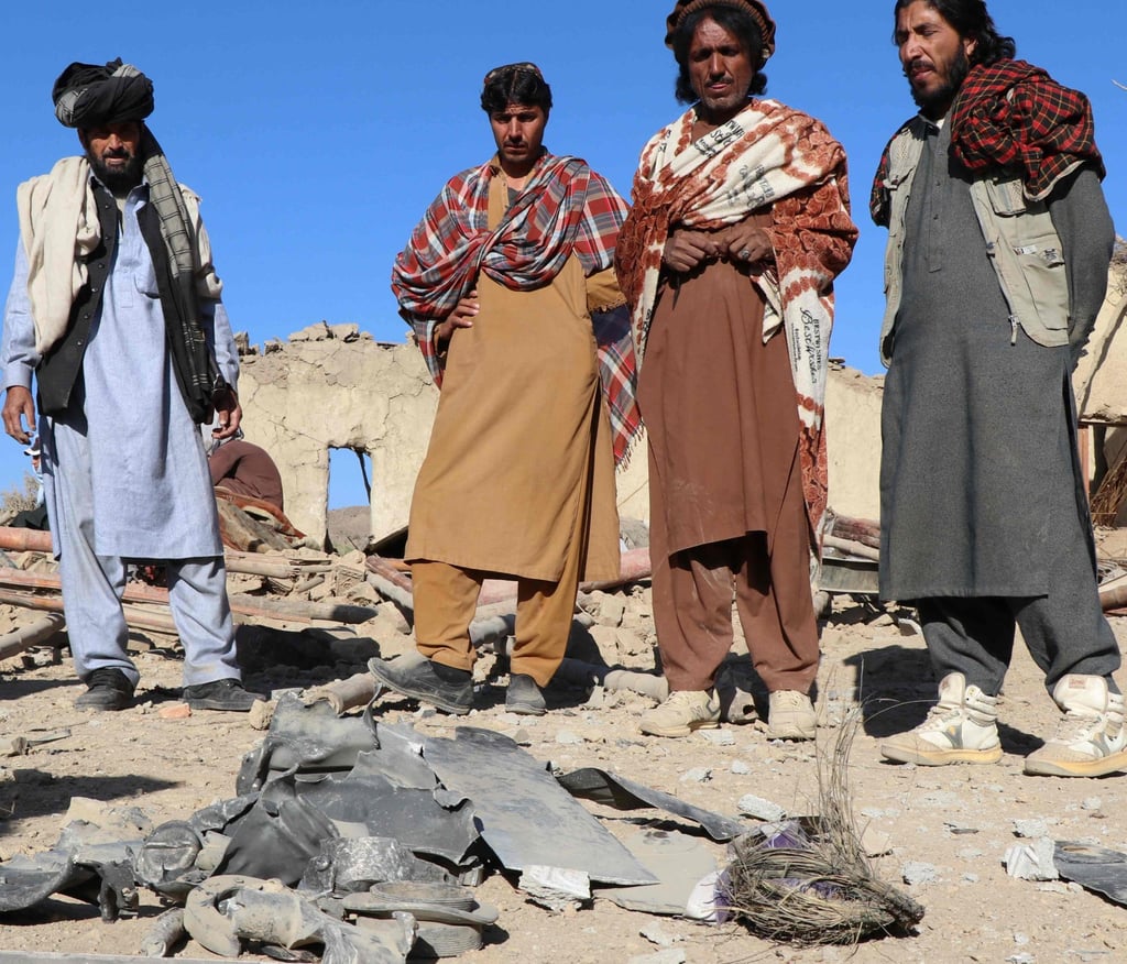 Afghan residents stand near remnants of a mortar shell at a house damaged by an air strike in Jige Mughalgai, Khost province, on Tuesday. Photo: AFP Afghan residents stand near remnants of a mortar shell at a house damaged by an air strike in Jige Mughalgai, Khost province, on Tuesday. Photo: AFP