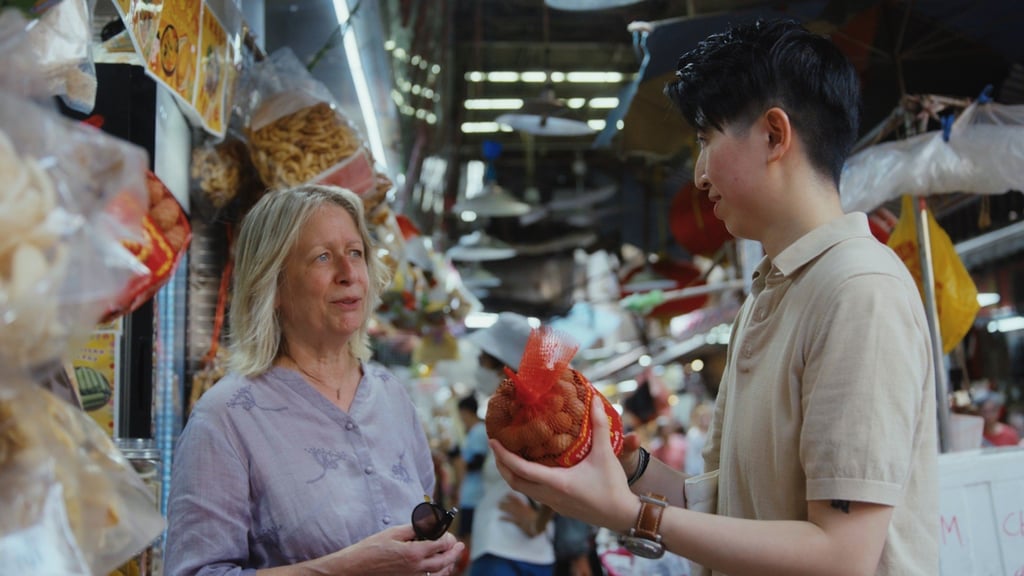 Food writer Annabel Jackson (left) says tamarind offers a glimpse into the origins of Macau’s fusion cuisine. She shops for the fruit with Otilia R. Novo, a chef and lecturer at the Macao University of Tourism, as the two friends prepare to cook a Macanese braised pork dish called porco balichão tamarinho.