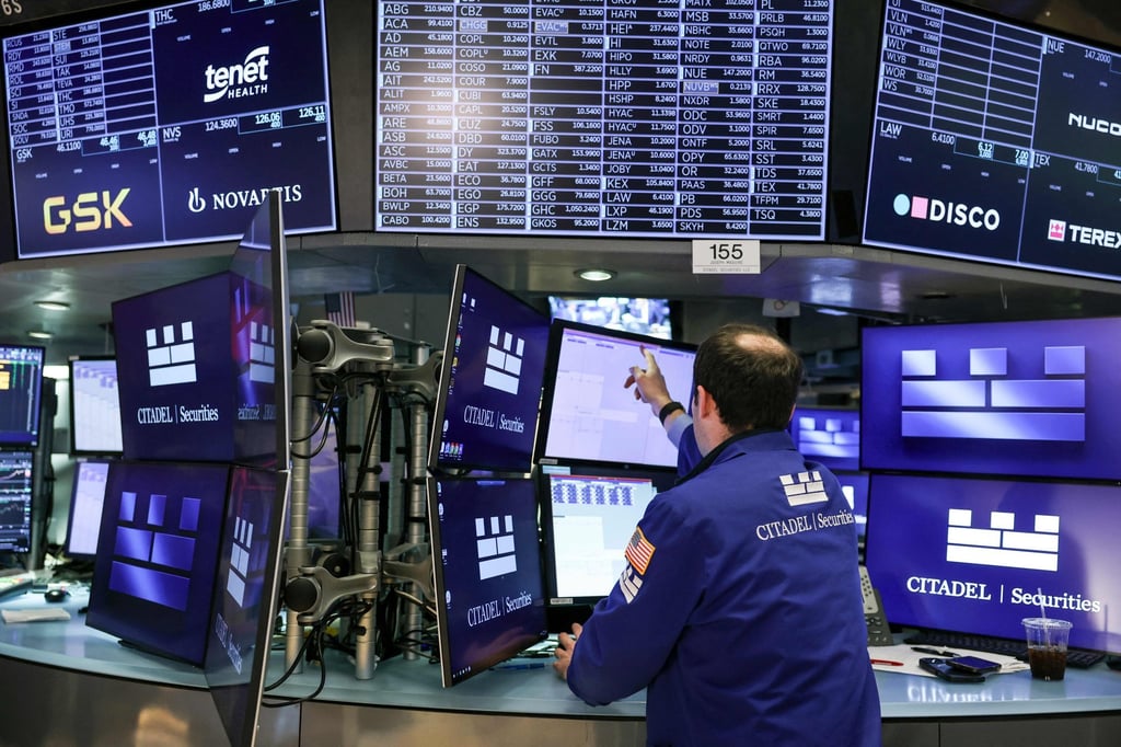 A trader on the floor of the New York Stock Exchange. Photo: AFP A trader on the floor of the New York Stock Exchange. Photo: AFP